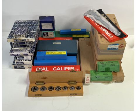 A collection of boxed engineers tools.