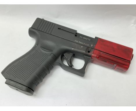 A Glock 9mm blank firer gum by Aksa Arms, serial number 21-00272 with case and used manual. Please note the limitations on th