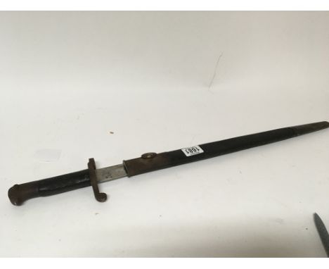 A British Military bayonet with a leather scabbard. Marks to the blade.