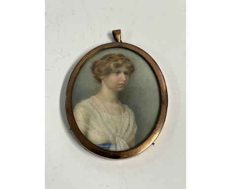 An Edwardian gilt framed portrait miniature of a young woman attributed to Nora Chambers 8 x 6cm