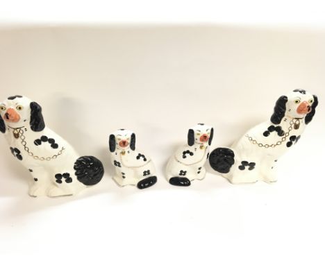 4 x Staffordshire ceramic dogs. Larger pair at approximately 12 inches tall and smaller pair are 7 inches - NO RESERVE