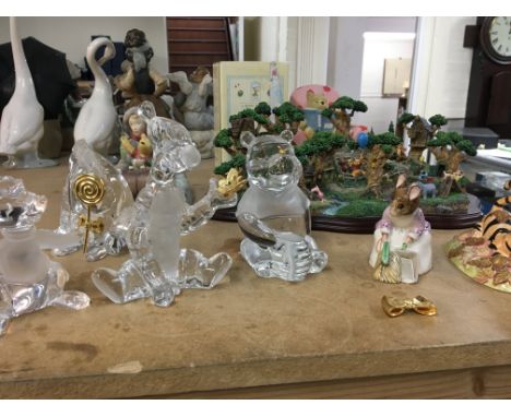 A collection of glass a ceramic including Royal Doulton Winnie the Pooh figures.