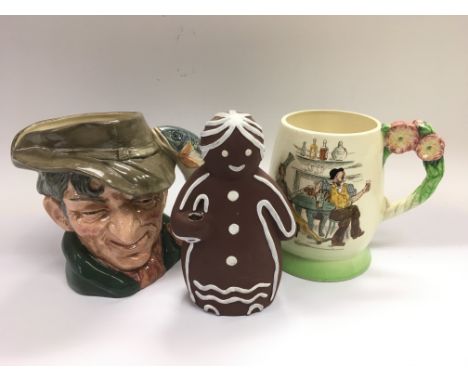 A Royal Doulton character jug, a Carltonware jug and a naive pottery figure (3) - NO RESERVE