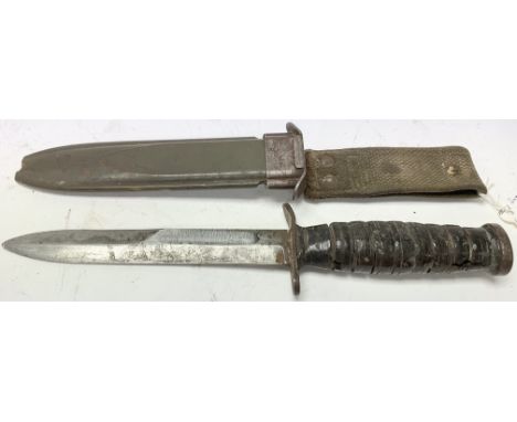 WW2 US M3 mk I fighting knife. This is an early 1943 issue with just the belt loop on an M8 scabbard. These were issued to th