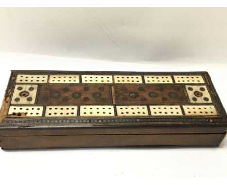 Likely a napoleonic prisoner of war made cribbage box inlaid with bone with contents. No reserve.