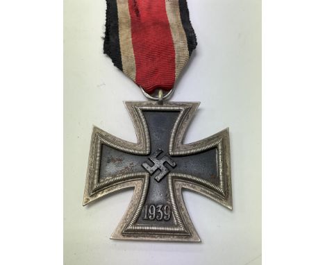 A period fake 3rd Reich iron cross 2nd class E.K II. This medal was produced directly after the war by using original blanks 