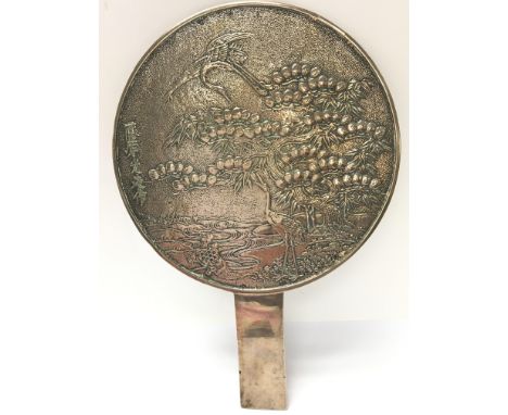 A good vintage Japanese silver plated hand mirror with decoration of two storks in landscape, possibly signed.