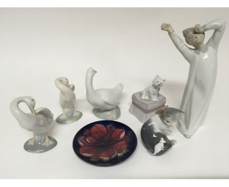 A Moorcroft dish and a collection of Lladro and Nao figures. No obvious damage or restoration (a lot)