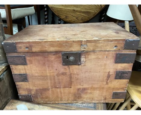 A small metal bound trunk measuring 39cm x 40cm x 62cm.