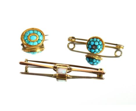 A 9ct gold bar brooch, set with central opal; a turquoise cluster bar brooch with central white stone; and an oval turquoise 