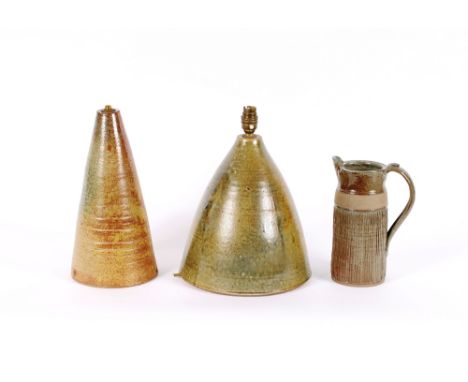 Two Studio pottery table lamp bases; and a Studio pottery milk jug, impressed C J to the base