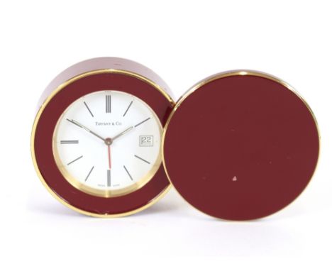 A Tiffany &amp; Co.red enamel cased travelling alarm clock, in original box