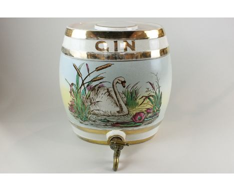 A pottery gin barrel with tap and painted swan decoration
