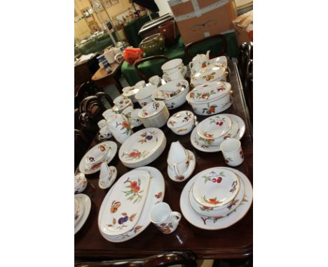 A large collection of Royal Worcester Evesham and oven to table dinner and tea ware, to include two casseroles, two bowls, co