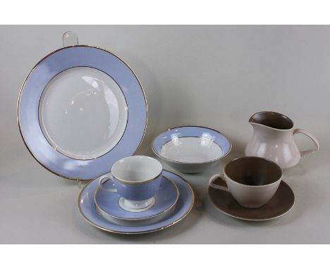 A Doulton part dinner service and a Poole brown and beige part tea set