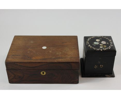 A  Victorian rosewood box with hinged top, and a Victorian papier mache and mother of pearl inlaid tea caddy