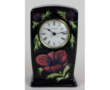 Moorcroft, an anemone decorated mantel clock with quartz movement, WM monogram and impressed Moorcroft Made in England, 16cm 