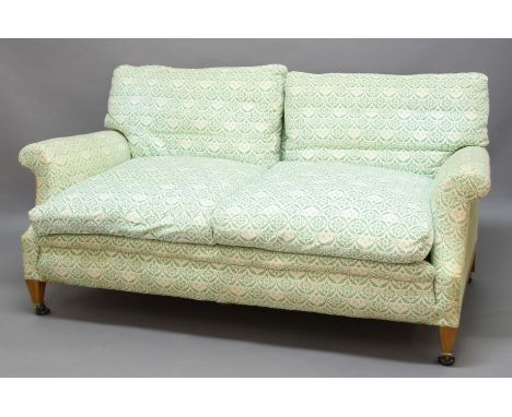 HOWARD TWO SEATER SEYMOUR SOFA, in its original green printed H &amp; S foliate upholstery, Lenygon &amp; Morant fabric label