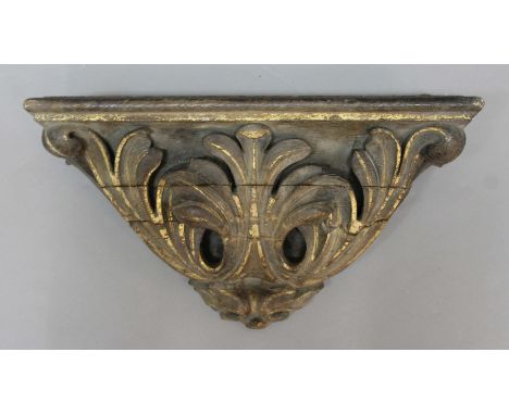 CARVED OAK BRACKET, gilt-painted with scrolling decoration, height 26cm, width 51cm, depth 20cm