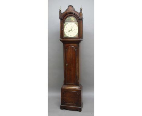 GEORGE III MAHOGANY LONGCASE CLOCK, the 12" painted dial beneath an arched panel and with maiden to the spandrils, subsidiary