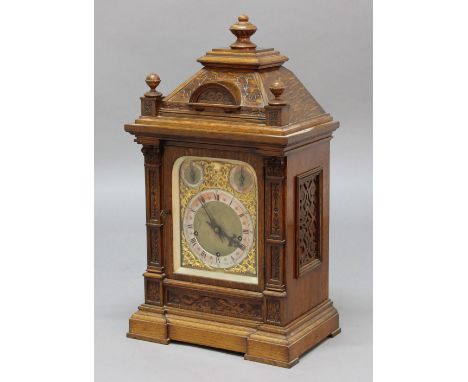 OAK CASED BRACKET CLOCK, the brass dial with 6 3/4" silvered chapter ring beneath a fast slow and a strike silent dial on a b