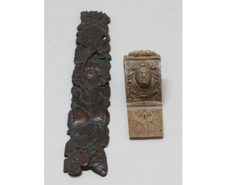 CARVED OAK PANEL, 17th century, with flower and leaf decoration, length 51cm; together with a carved oak wall bracket (2)