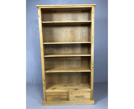 Light wood contemporary bookcase with adjustable shelves and two drawers under, approx 176cm x 94cm x 28cm 