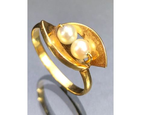 Unmarked Gold ring set with two pearls 'M' 