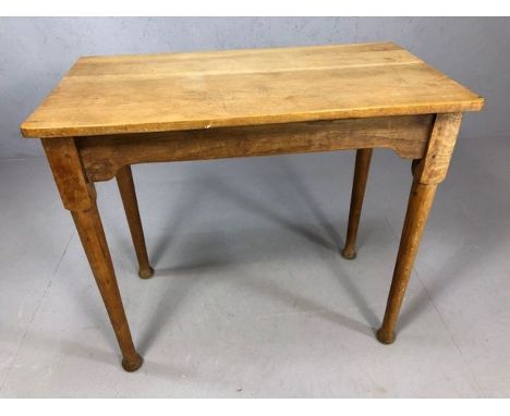 Light wood occasional table on tapering legs, approx 82cm x 45cm x 72cm