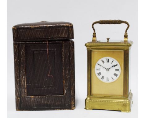 Brass cased repeater carriage clock with bevelled glass panels, leather case 