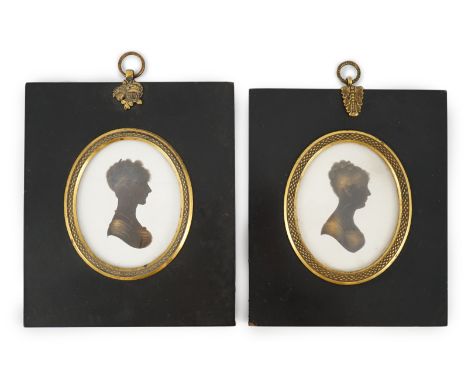 John Miers (1756-1821) Silhouettes of young ladiespainted and bronzed plaster (2)both looking to sinister8 x 6.5cm.***CONDITI