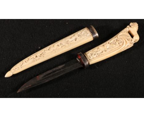 19th century ivory dagger, the sheath depicting a dog chasing a hare with white metal mounts, the handle with figure holding 