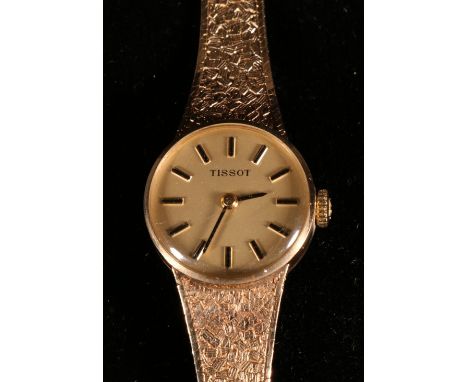 Lady's Tissot 9ct gold bracelet watch CONDITION REPORT: 22 grams