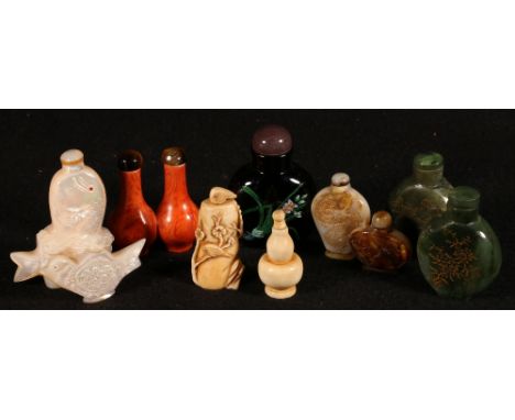 Eleven various mid 20th century Chinese snuff bottles, ceramic, hardstone, mother of pearl etc (11) CONDITION REPORT: Most ar
