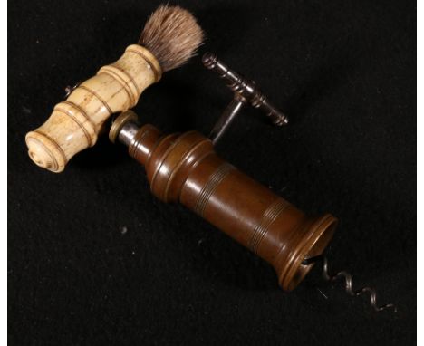 19th century bone handled corkscrew with applied brass plaque depicting the British Army, 21cm tall