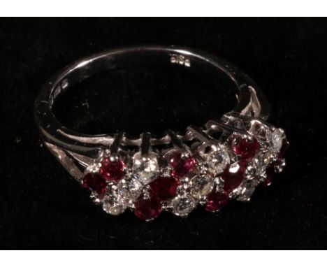 Diamond and ruby ring with alternating diagonal bands in three, 18ct white gold 1975