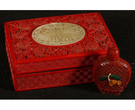 Early 20th century Chinese cinnabar lacquer box and cover of rectangular section, decorated with chrysanthemums and key fret 