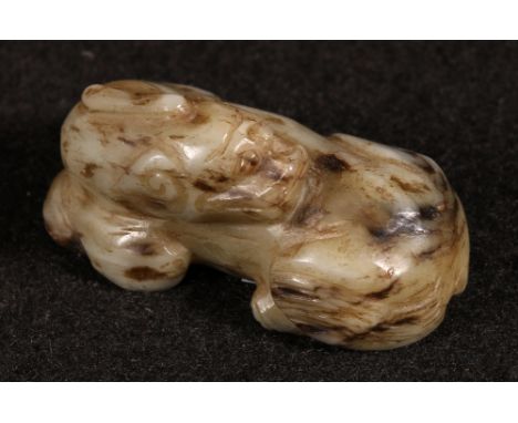 Carved jade model of a dragon, 5cm long