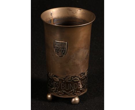 German silver shooting competition prize cup '19 Deutsches Bundesschiessen Koln 1930' bearing shield arms raised on four ball