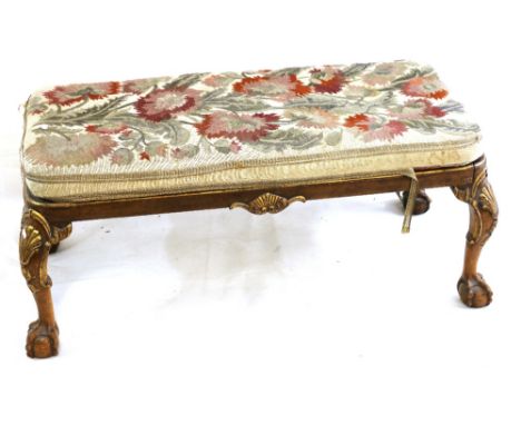 19th century French foot stool upholstered in floral tapestry depicting flowers raised on shell carved cabriole supports, ter