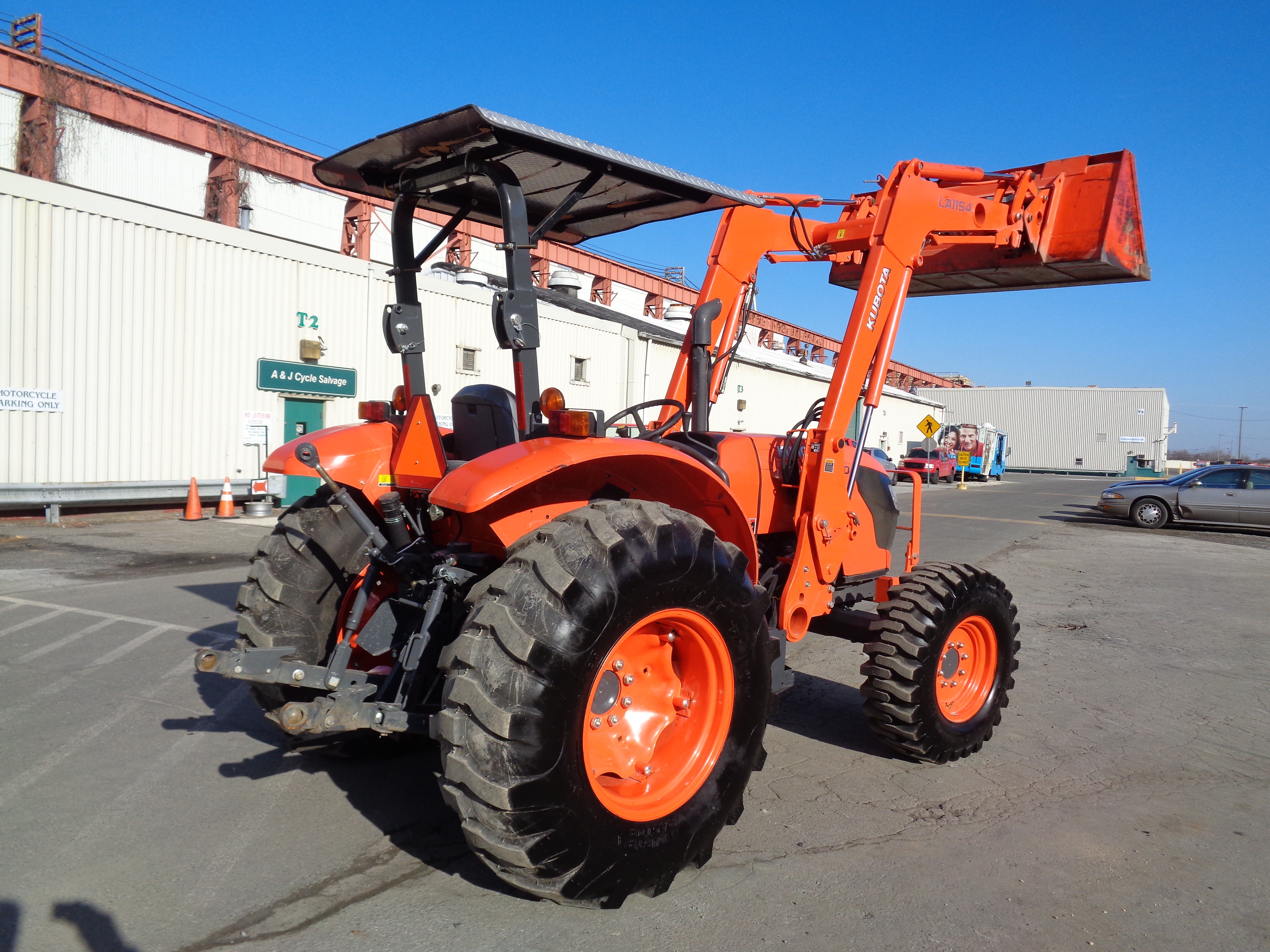 Make Kubota Model M6060 SN 61972 Year 2016 Hours 124 4x4 72in Bucket