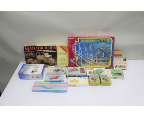 A COLLECTION OF ASSORTED UNMADE MODEL KITS to include; Rosebud Kit master, motorised box wagons (2), a boxed MGTC Sport, a Ke