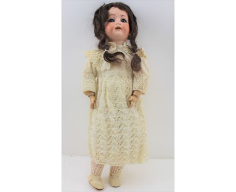 A HEUBACH-KOPPELSDORF BISQUE HEADED DOLL, with composition body, impressed factory marks to the back of the neck, includes Ge