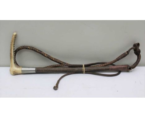 A GENTLEMAN'S HUNTING CROP by Swaine &amp; Adeney Ltd, with horn grip, plated collar engraved with initials, "J.C.P", plaited