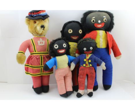 A "MERRYTHOUGHT" BEEFEATER TEDDY BEAR, 48cm high, together with four soft toy gollies, including Chad Valley and Deans Rag Bo