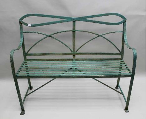 A 19TH CENTURY WROUGHT IRON TWO PERSON BENCH with later top rail, finished in green, 123cm at widest point 