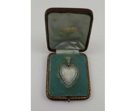 A WHITE FIRE OPAL HEART SHAPE PENDANT, old cut diamond framed in yellow and white metal, with suspension loop, pendant (inclu