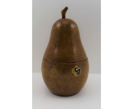 A TREEN FRUITWOOD TEA CADDY IN THE FORM OF A PEAR, the hinged cover with stalk finial, in the Georgian style, fitted lock wit