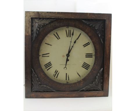 A 19TH CENTURY OAK CASED WALL TIMEPIECE by Pearce of Stratford-upon-Avon, the square case with carved leaf decoration, circul