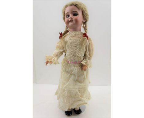 A HALBIG (Simon &amp; Halbig) GERMAN BISQUE HEADED DOLL, with composition body, 40cm high, back of the neck inscribed, includ